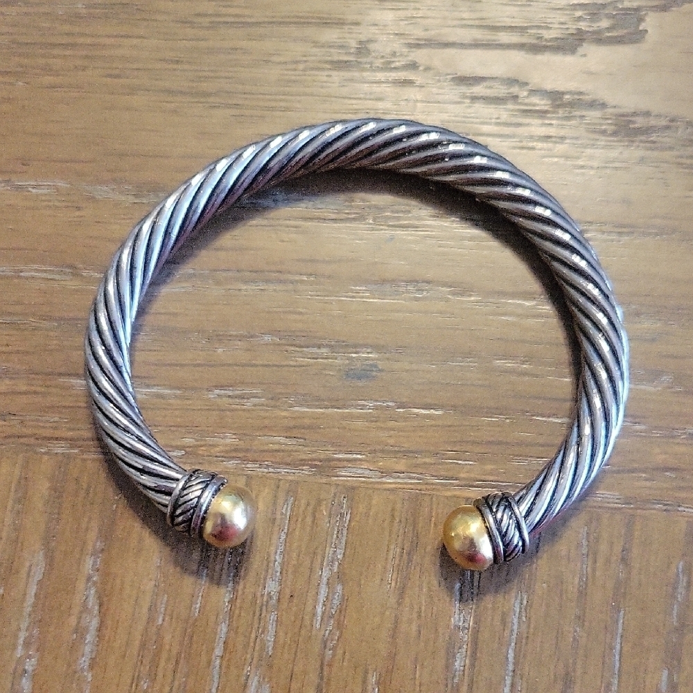 Twisted Silver and Gold tone Bangle bracelet